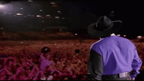How many no. 1 Hot Country Songs does Garth Brooks have?