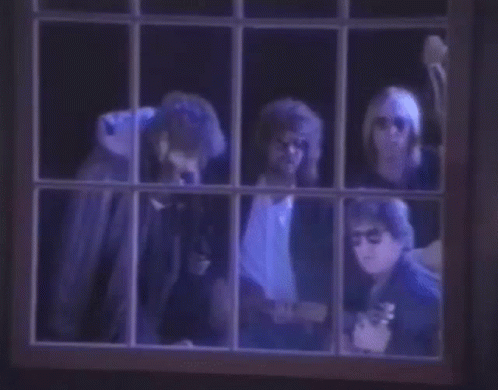 In the video for “End of the Line,” a guitar in a rocking chair symbolizes which Traveling Wilburys singer?