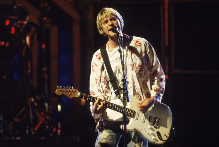 Who did Nirvana knock out of the top spot when they hit no. 1?
