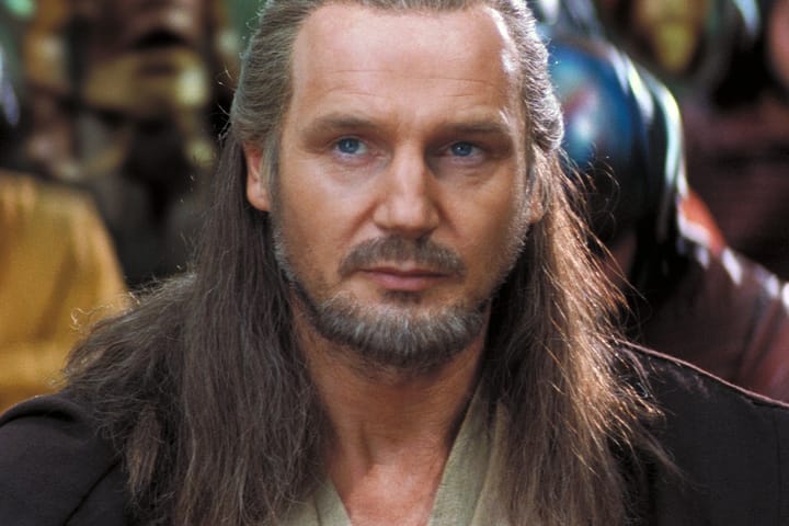 In Star Wars: Episode I – The Phantom Menace, what is Qui-Gon Jinn's communicator prop made out of?
